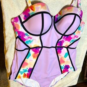 Torrid one piece swimsuit. Offers structure and style with underwire.